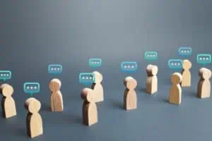 goldman sachs small business survey, wooden figurines with conversation bubbles