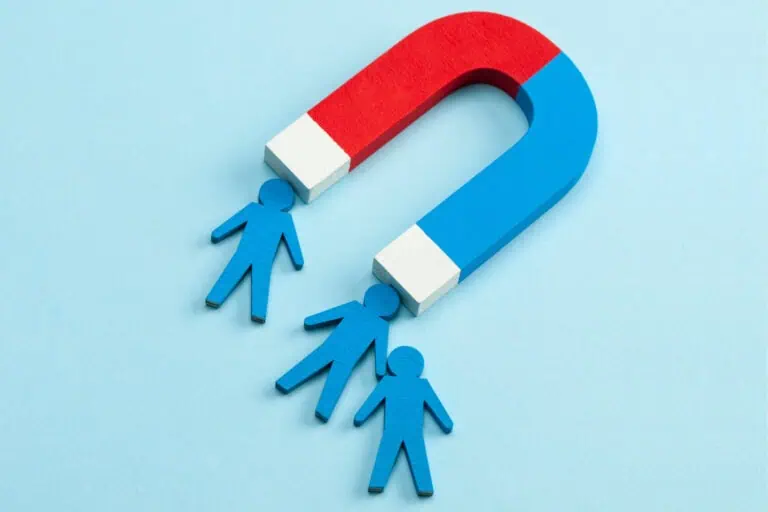 magnet attracting human figures, 5 simple ways to optimize your website for lead generation