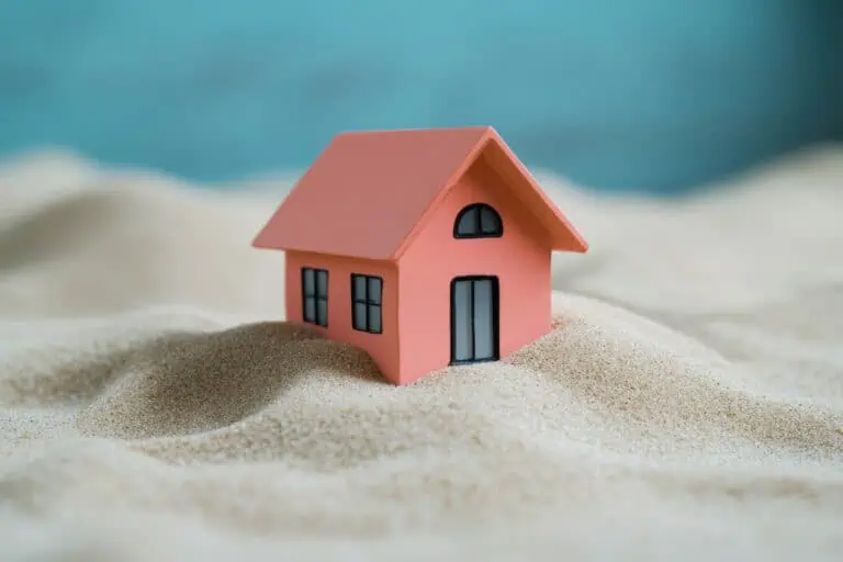 house on sandy uneven surface