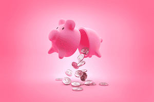 piggy bank with coins falling out