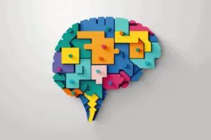 graphic of brain with colorful puzzle pieces